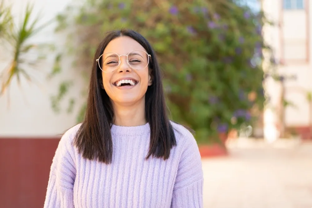 Patient smiling outdoors near White Rock, New Mexico